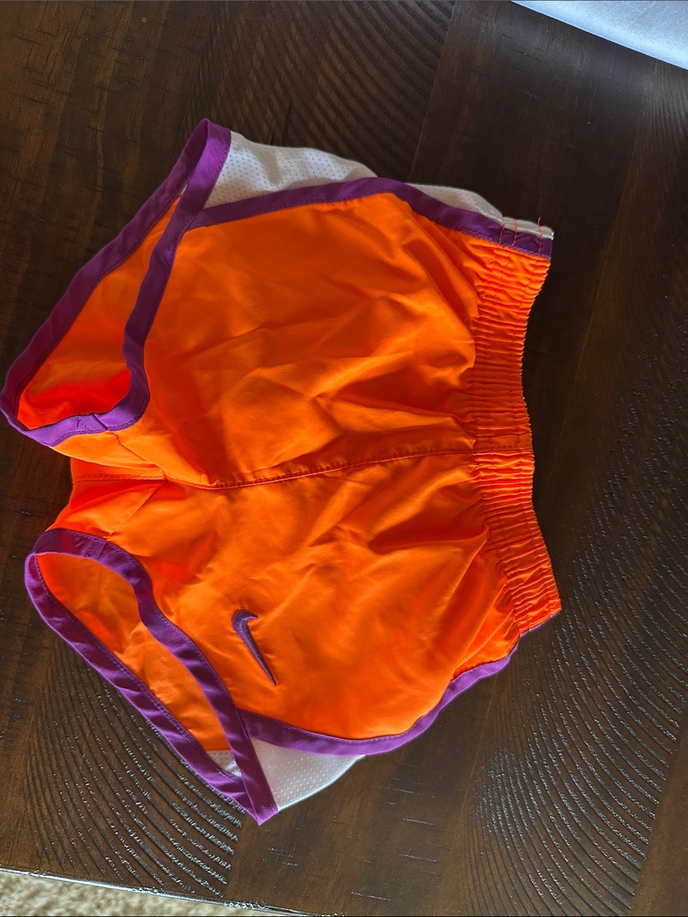 Nike Bright Orange Athletic Shorts with Purple Trim